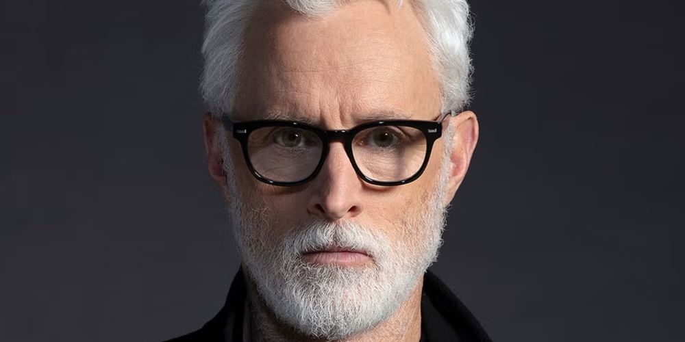 john-slattery-uomo-pioggia